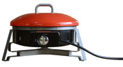 A tabletop portable propane gas grill with a red lid and metallic legs. The grill features a temperature control knob and a connected hose, designed for outdoor cooking.