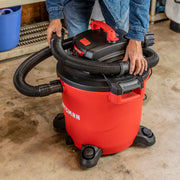 Photo of Craftsman wet/dry vacuum CMXZVBE38759 with a black hose in a garage setting.